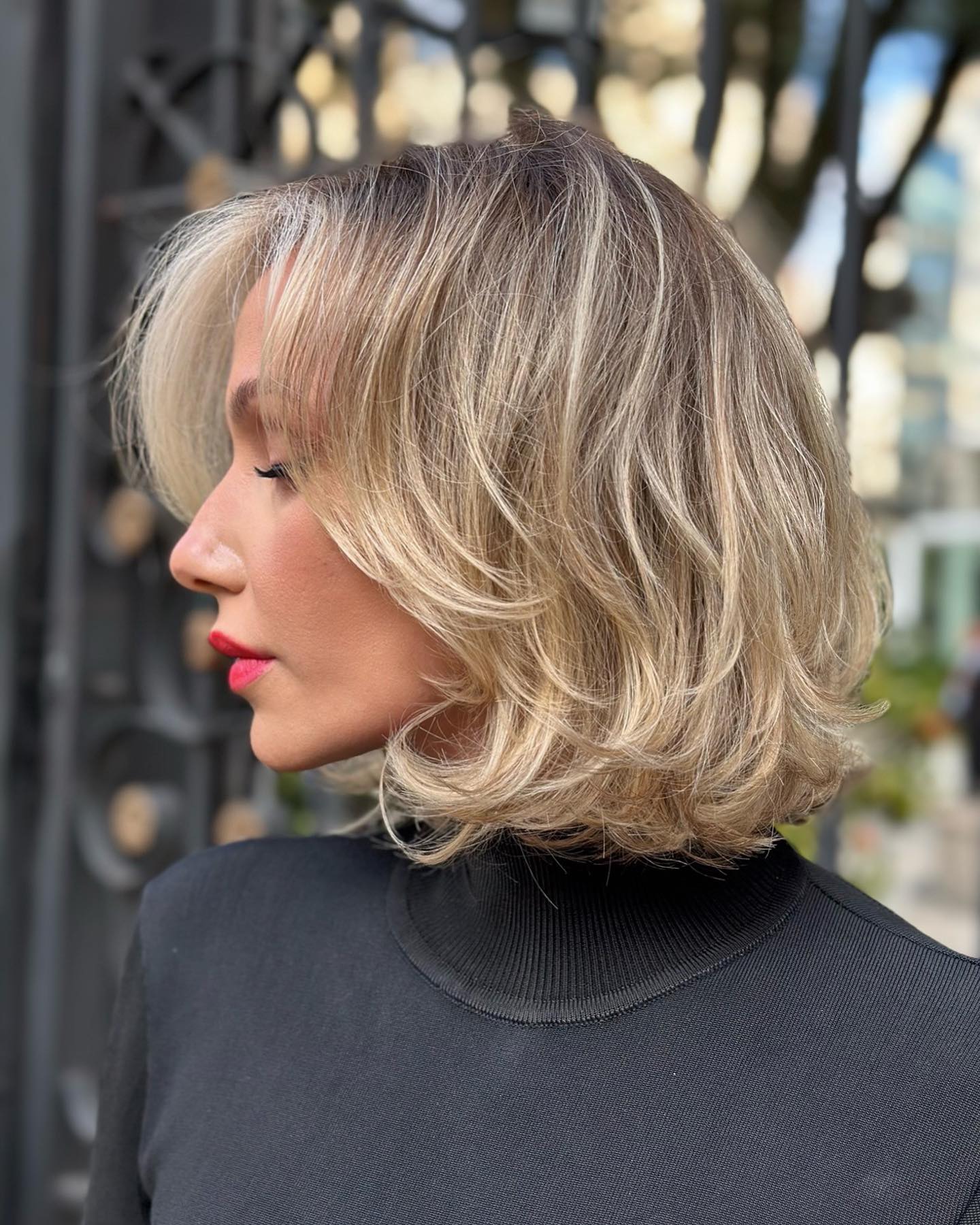 Blonde Lob with Short Layers and Bangs