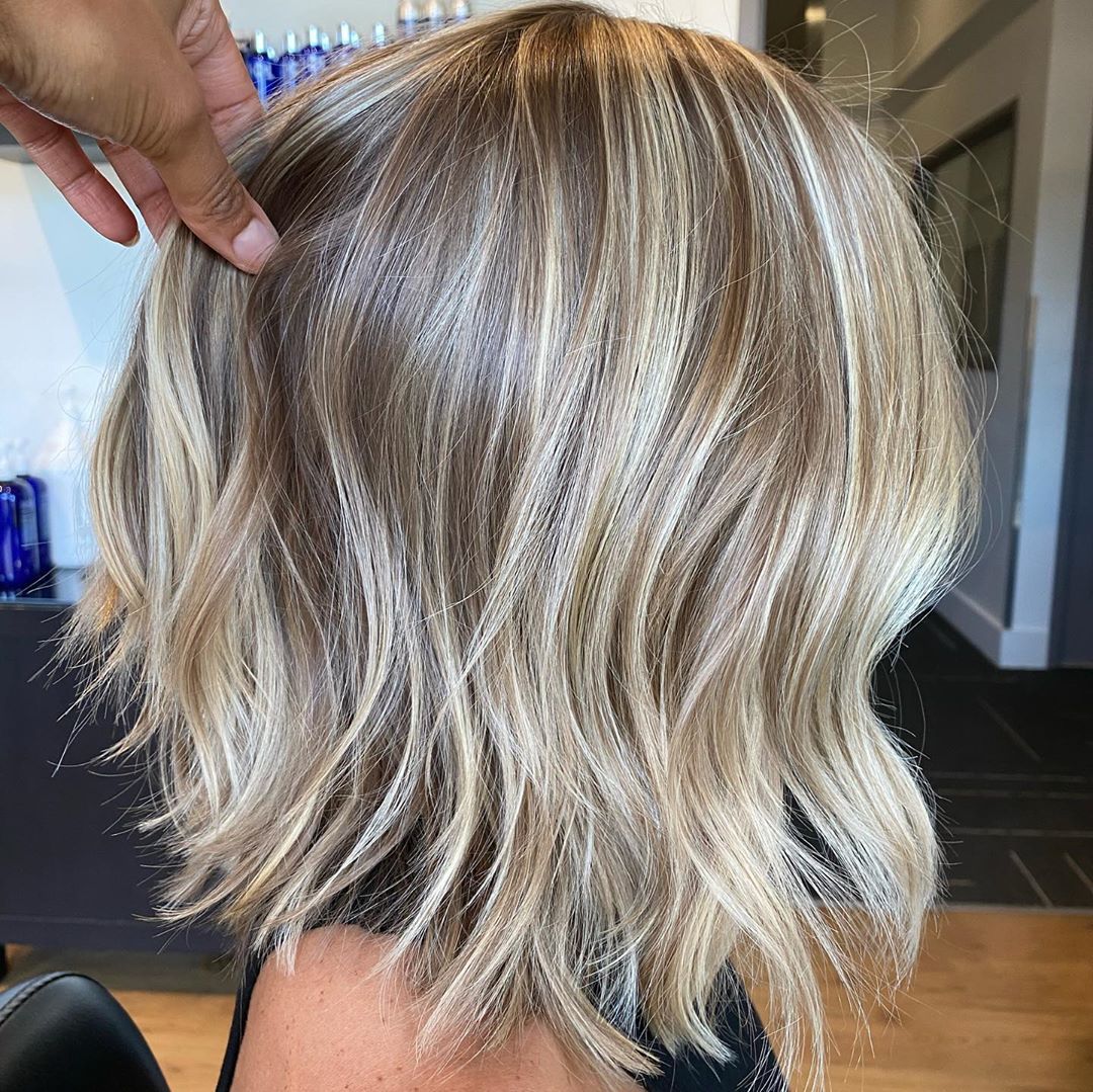 Voluminous Medium Layered Hairstyle