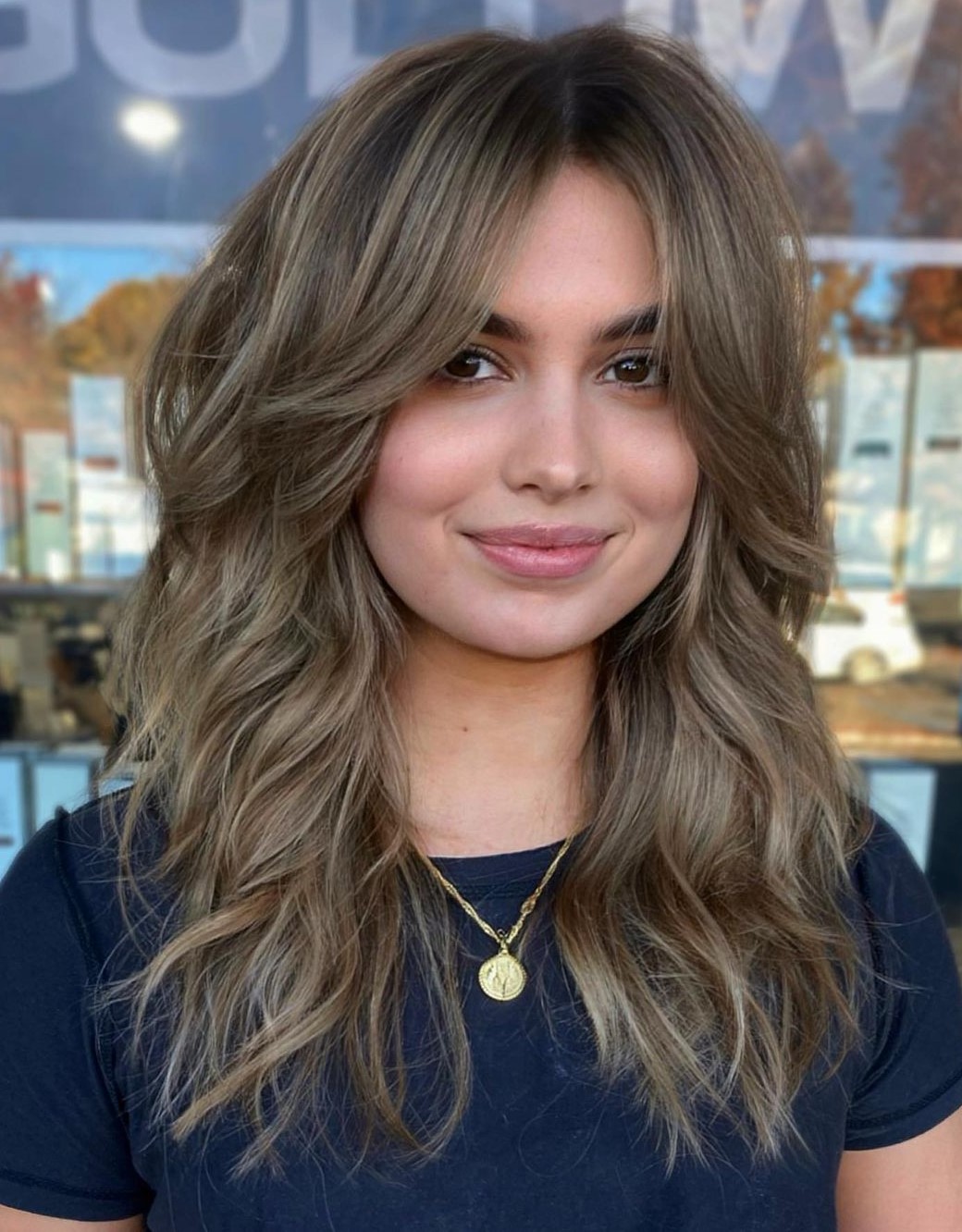 Long Hairstyle with Bangs for Round Faces