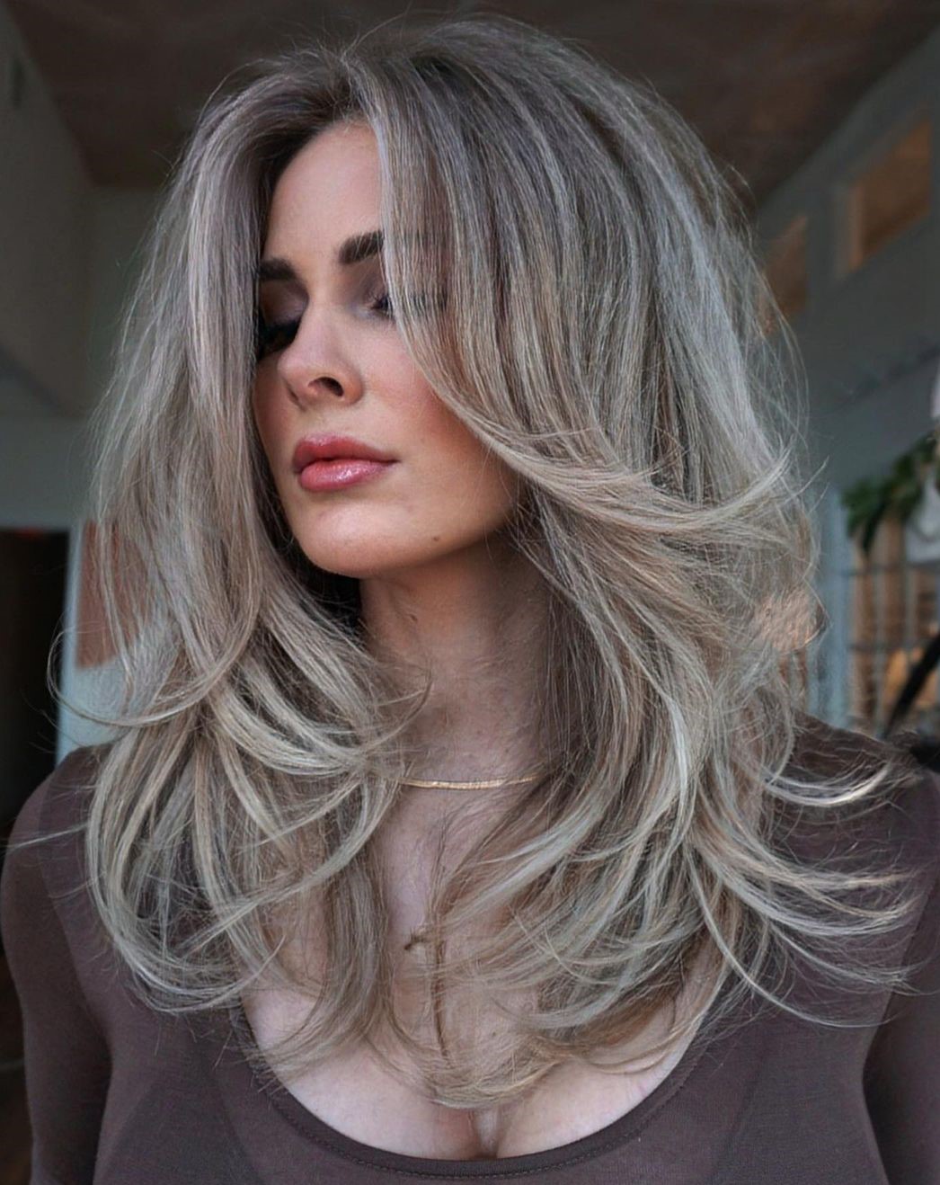 Long Ash Blonde Hair Transitioning to Gray