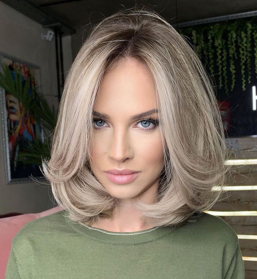 Haircut with Swoopy Layers for Big Foreheads