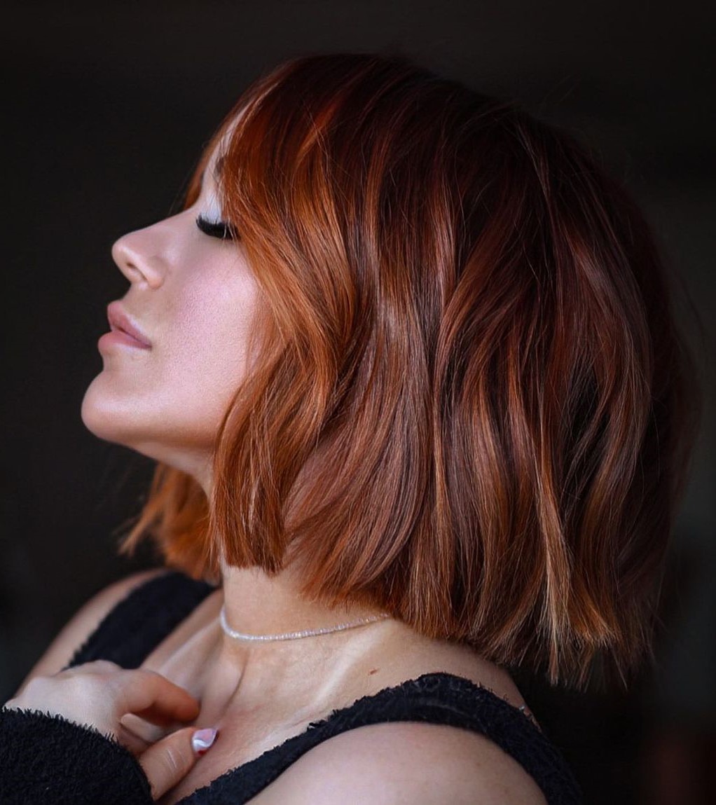 Blunt Red Bob with Bright Face-Framing Pieces