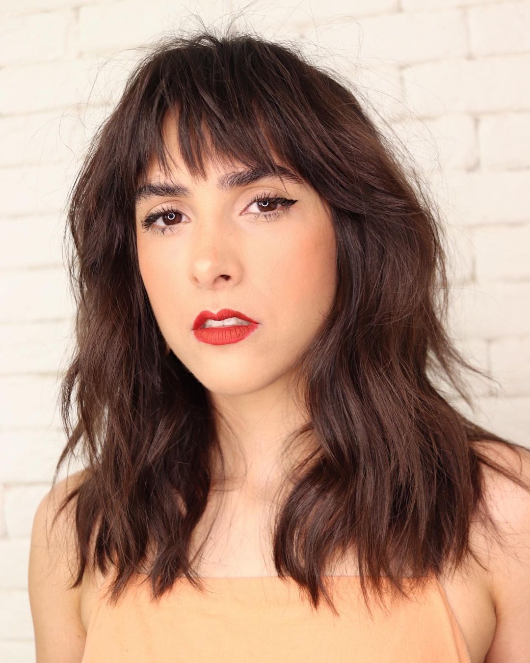 Wavy Choppy Cut with Straight Bangs