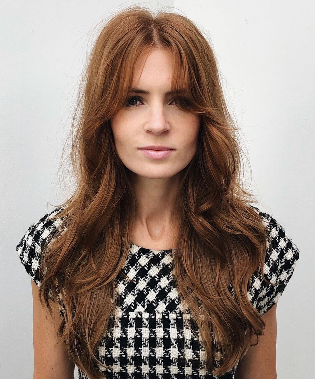 Long Hair with Face-Framing Layers and Bangs