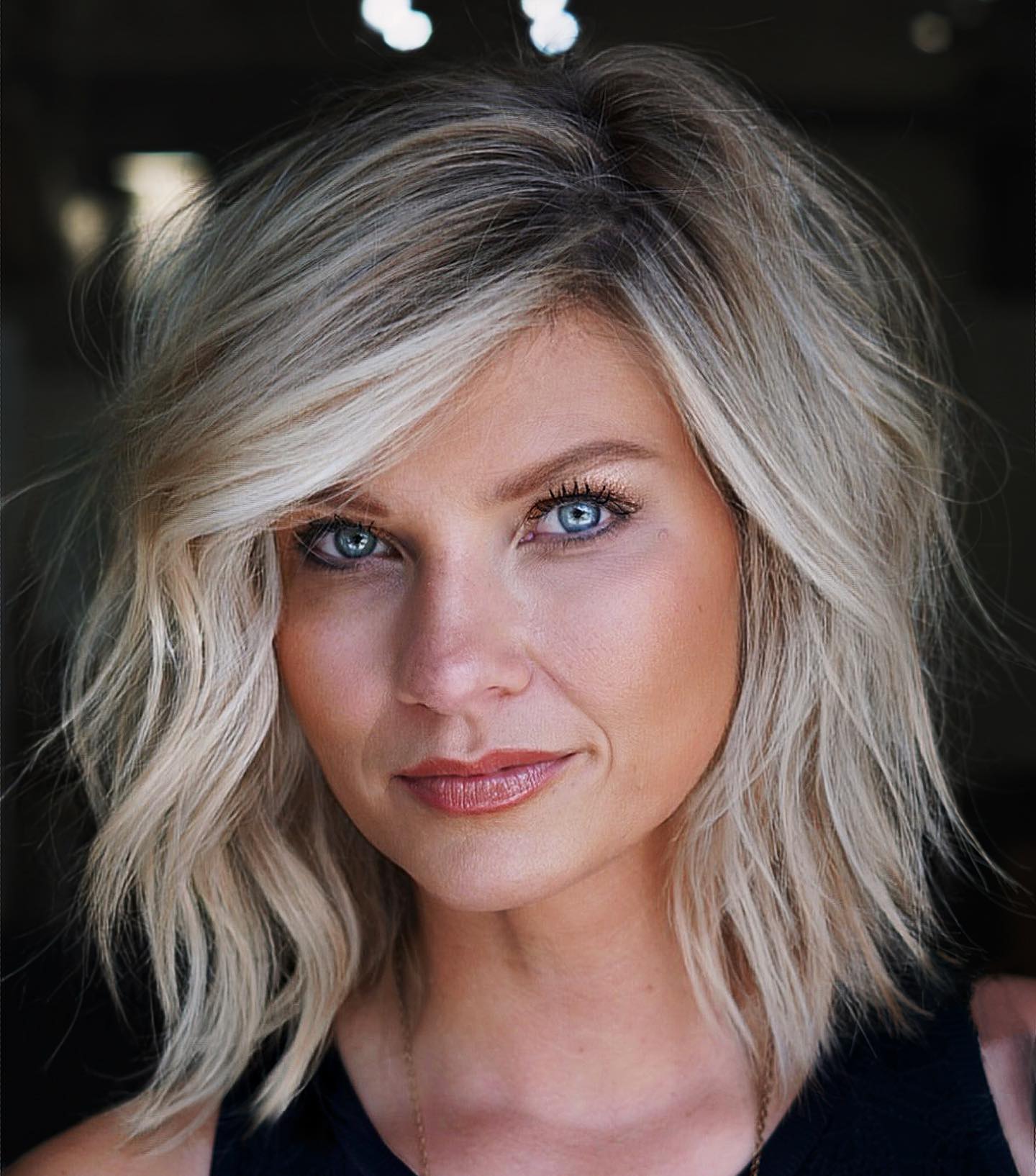 Collarbone Layered Bob with Side Bangs