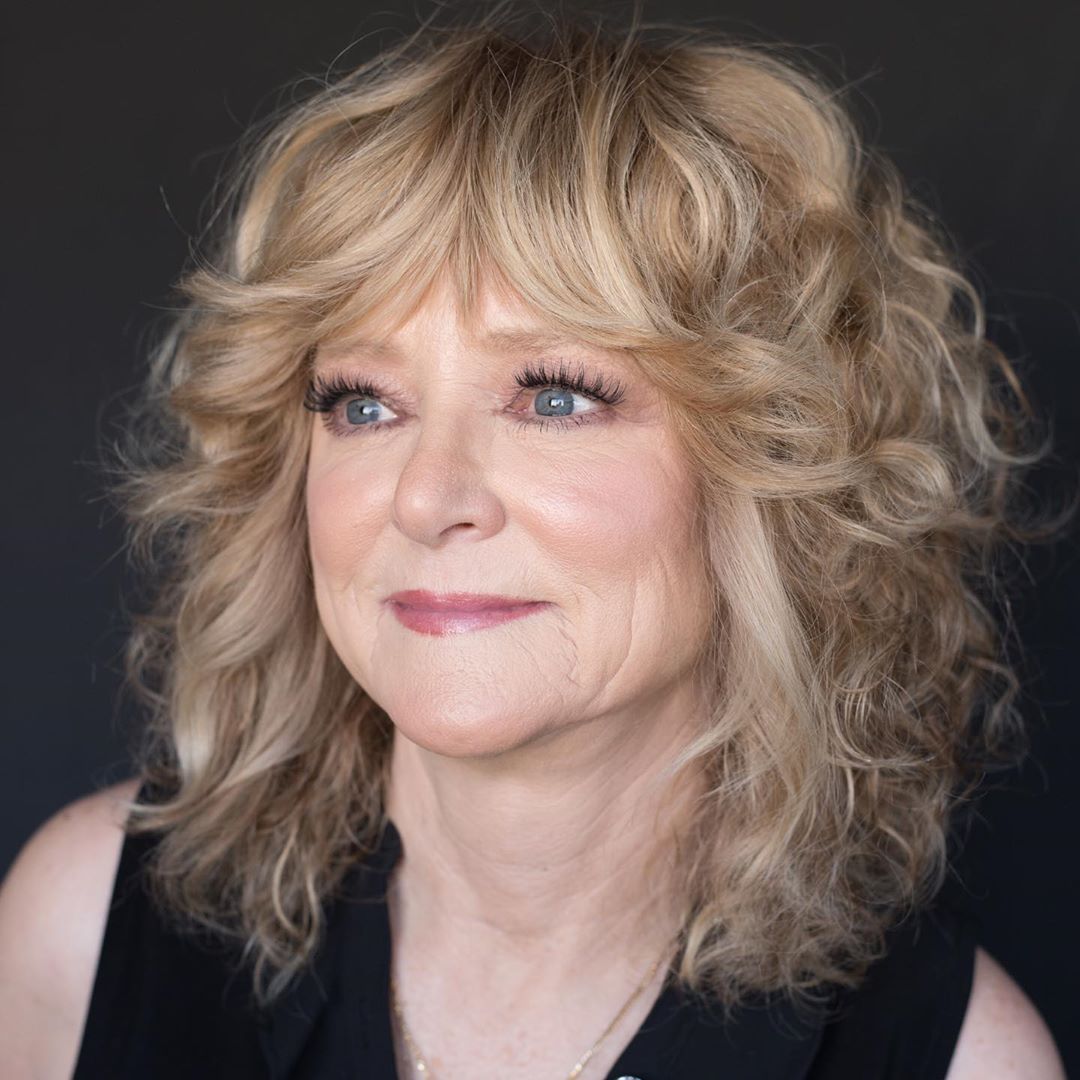 Over 50 Curly Medium Haircut with Bangs