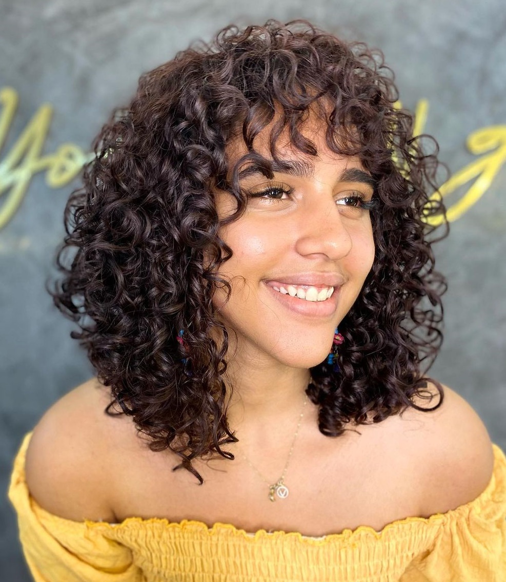 Soft Medium Curly Cut with Bangs
