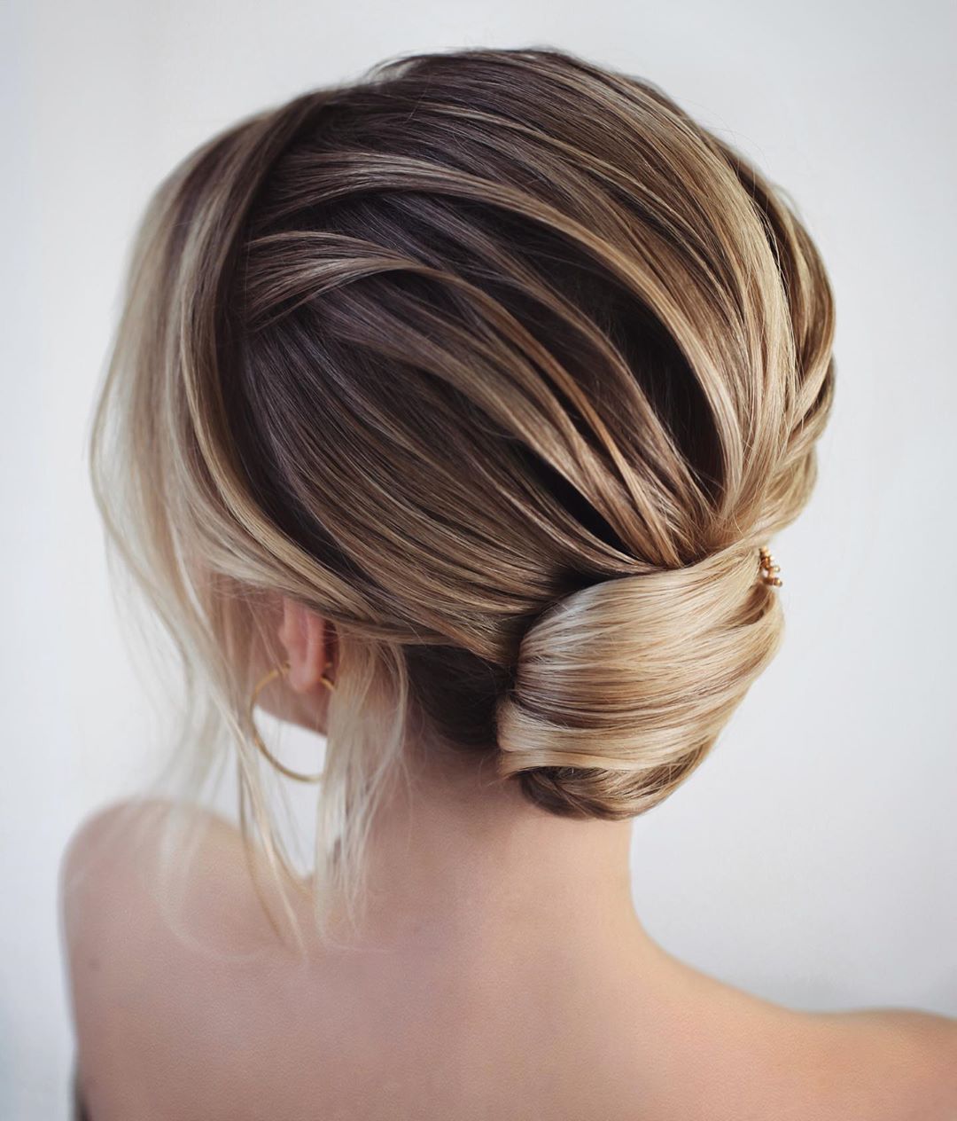 Sophisticated Short Hair Nape Bun with a Fringe