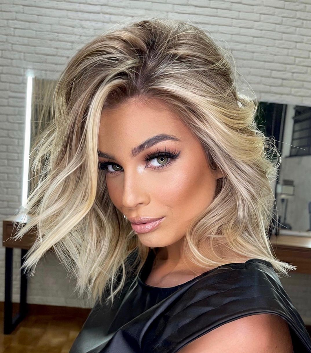 Gorgeous Thick Medium Hairstyle with a Side Part