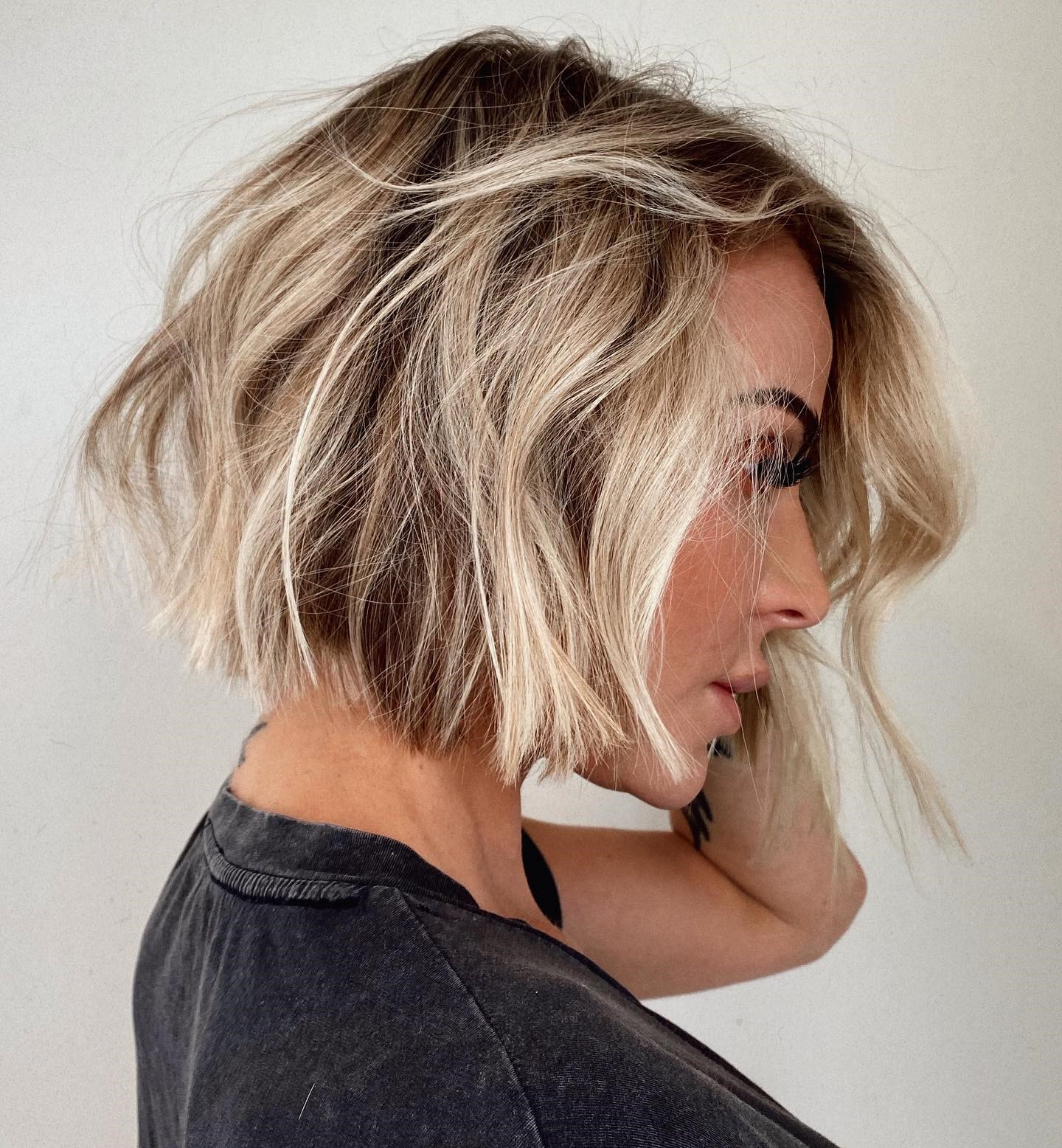 Messy Chin-Length Bob with Blonde Balayage