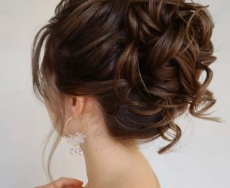 Voluminous Updo for Medium Wavy Hair