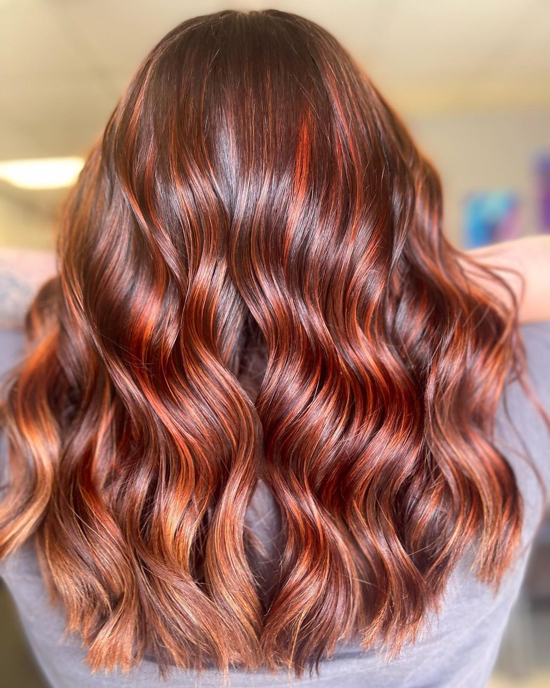 Orange Highlights on Copper Hair