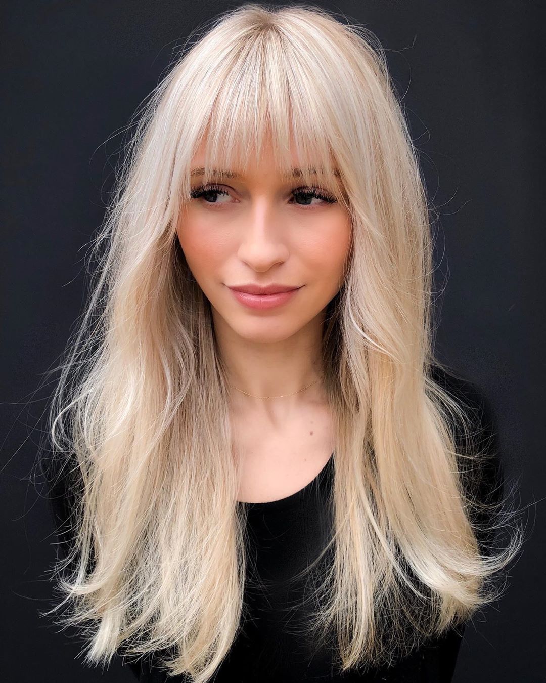 Long Blonde Hair with Thin Bangs