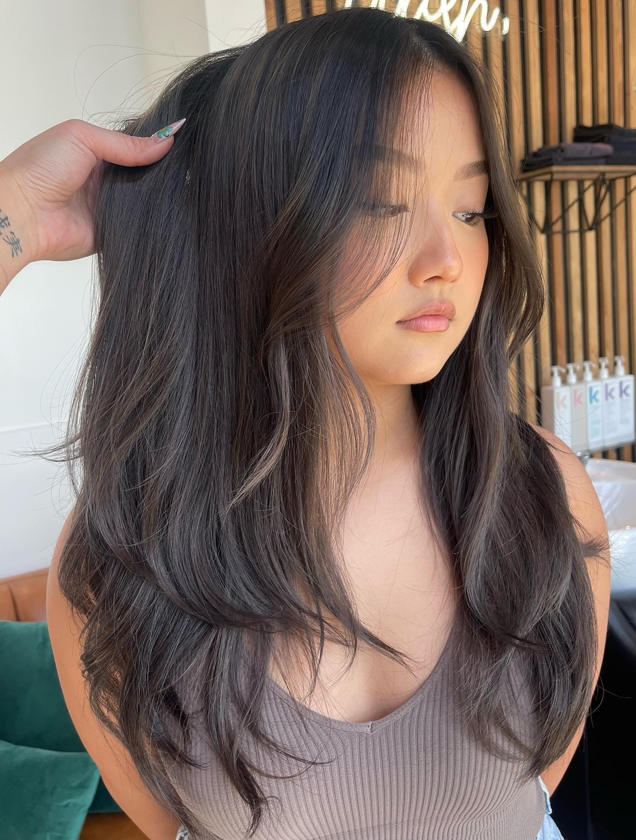 Brunette with Natural-Looking Ash Brown Highlights