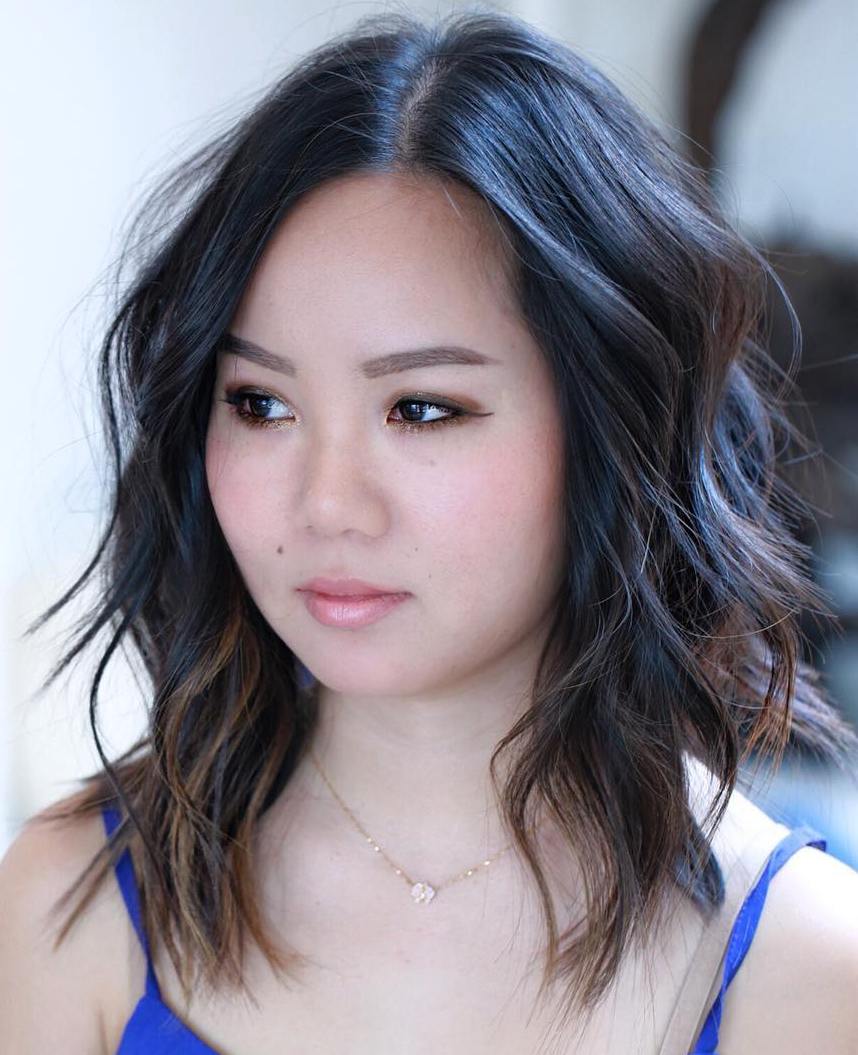 Medium Shaggy Hairstyle with Off-Centre Part