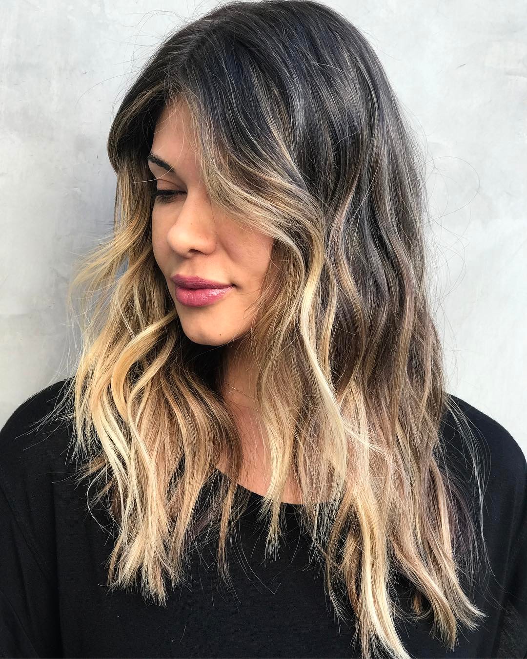 Wavy Shaggy Face-Framing Long Hairstyle