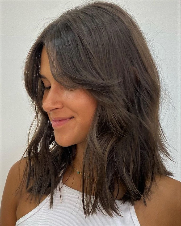 Medium Haircut with Long Curtain Bangs