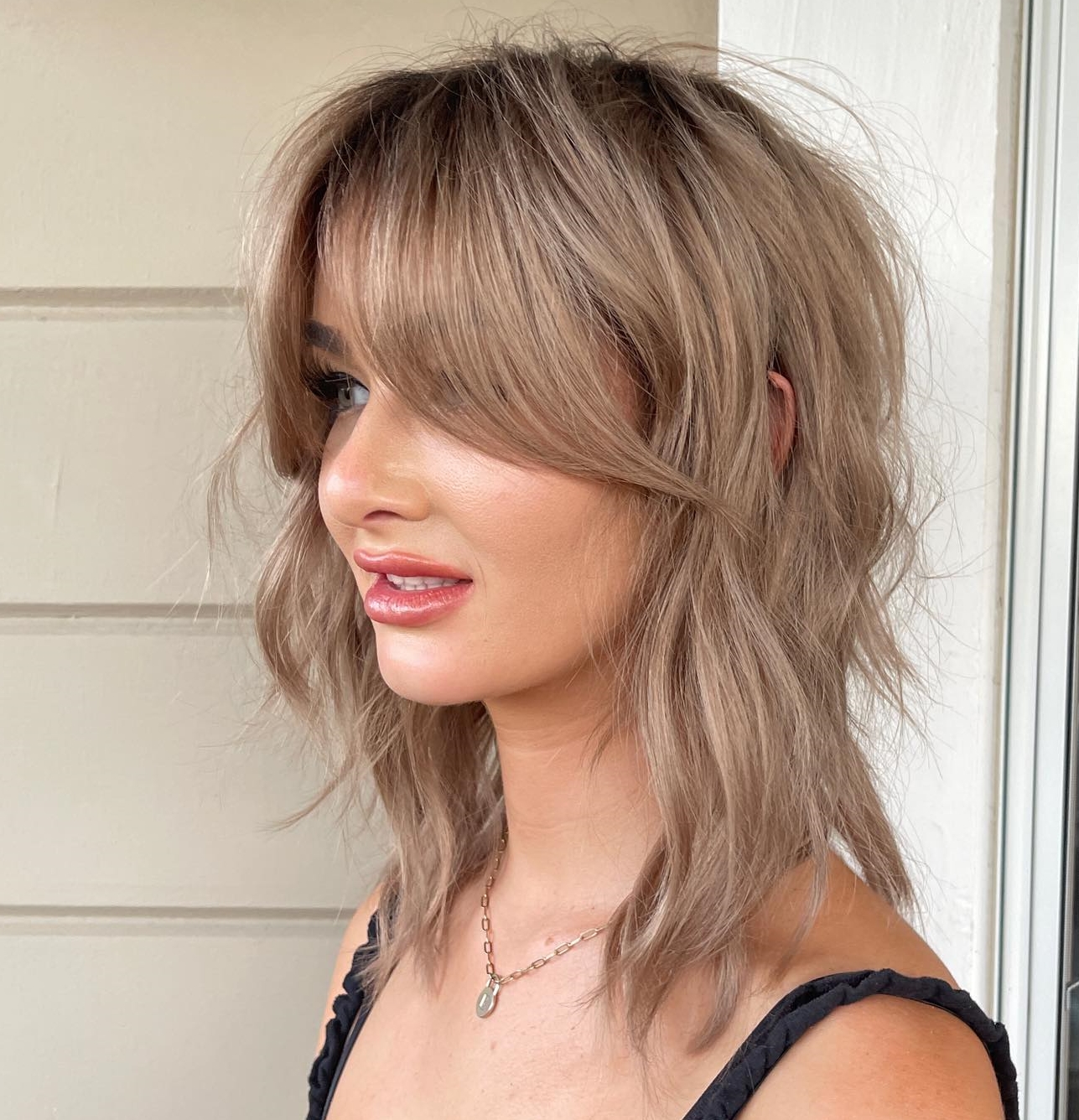 Tousled Shoulder-Length Shaggy Cut
