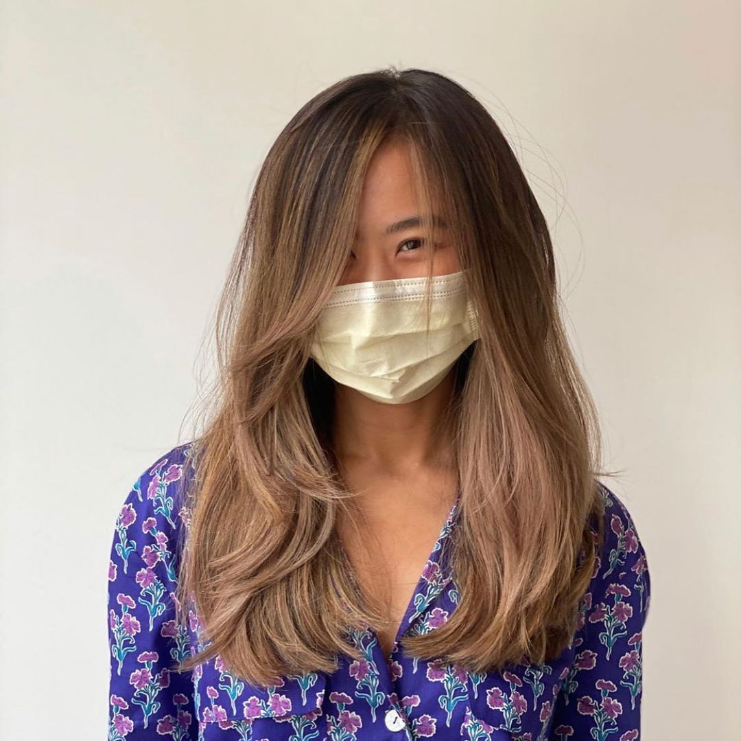 Easy-to-Maintain Hair with Layers and Bangs