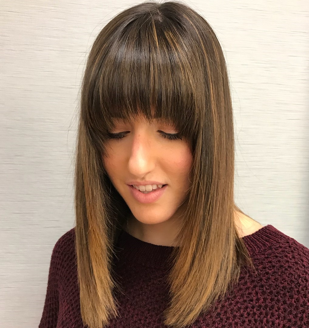 Pin-Straight Hair with Arched Bangs for a Long Face