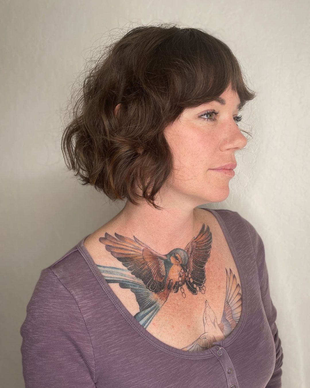 Shaggy Bob with Curtain Bangs for Wavy Hair