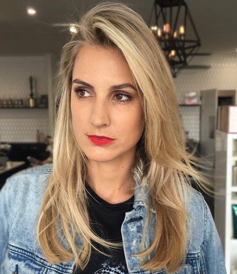 Medium Layered Hairstyle with a Side Part