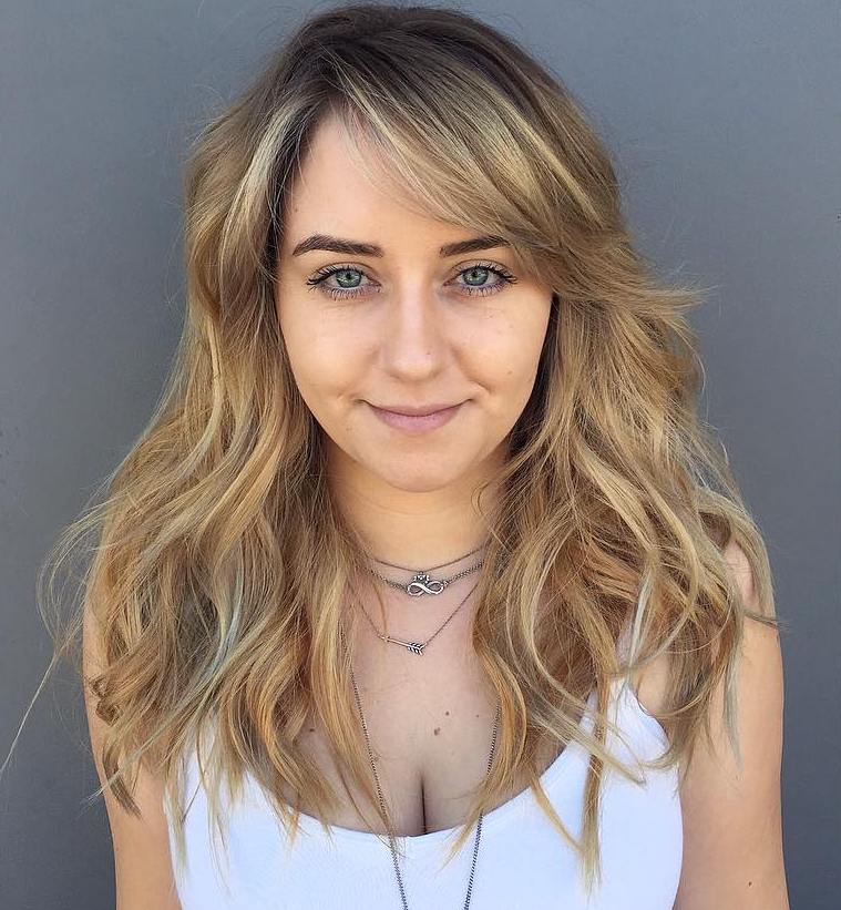 Long Honey Blonde Hairstyle with Layers