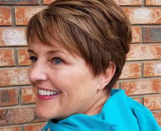 brown layered pixie over 50