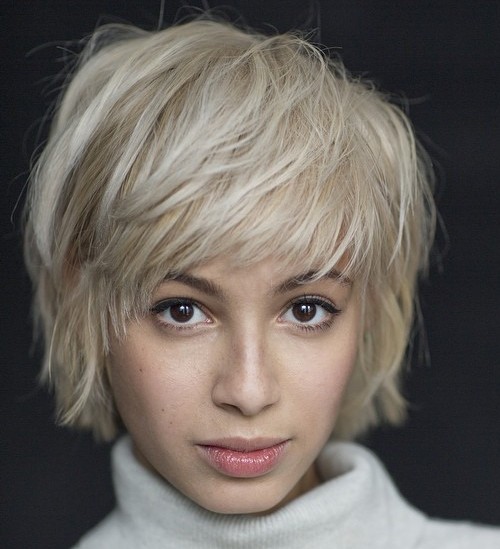Short Blonde Layered Hairstyle with Bangs