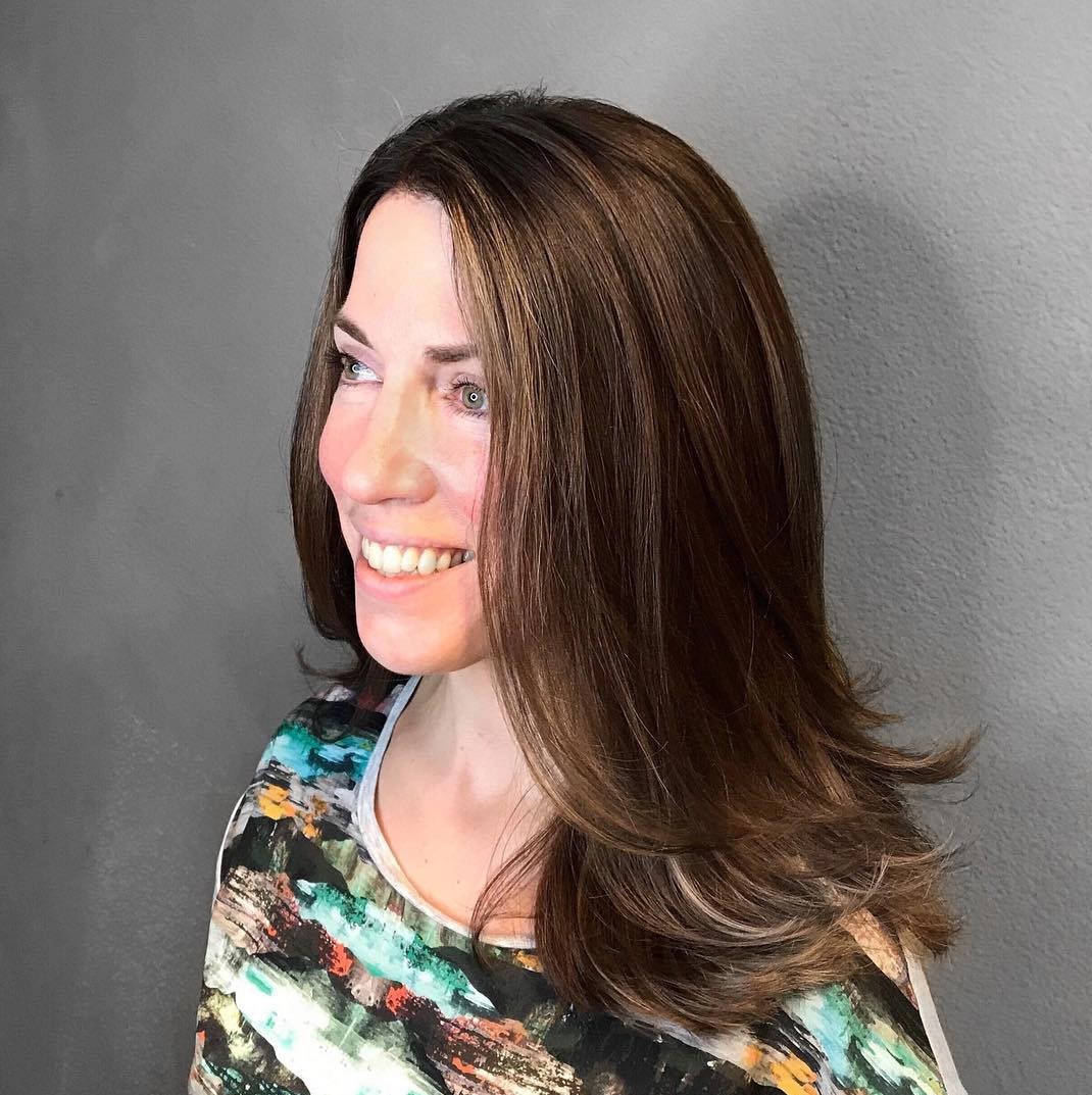 Medium Blowout Hairstyle for Long Faces