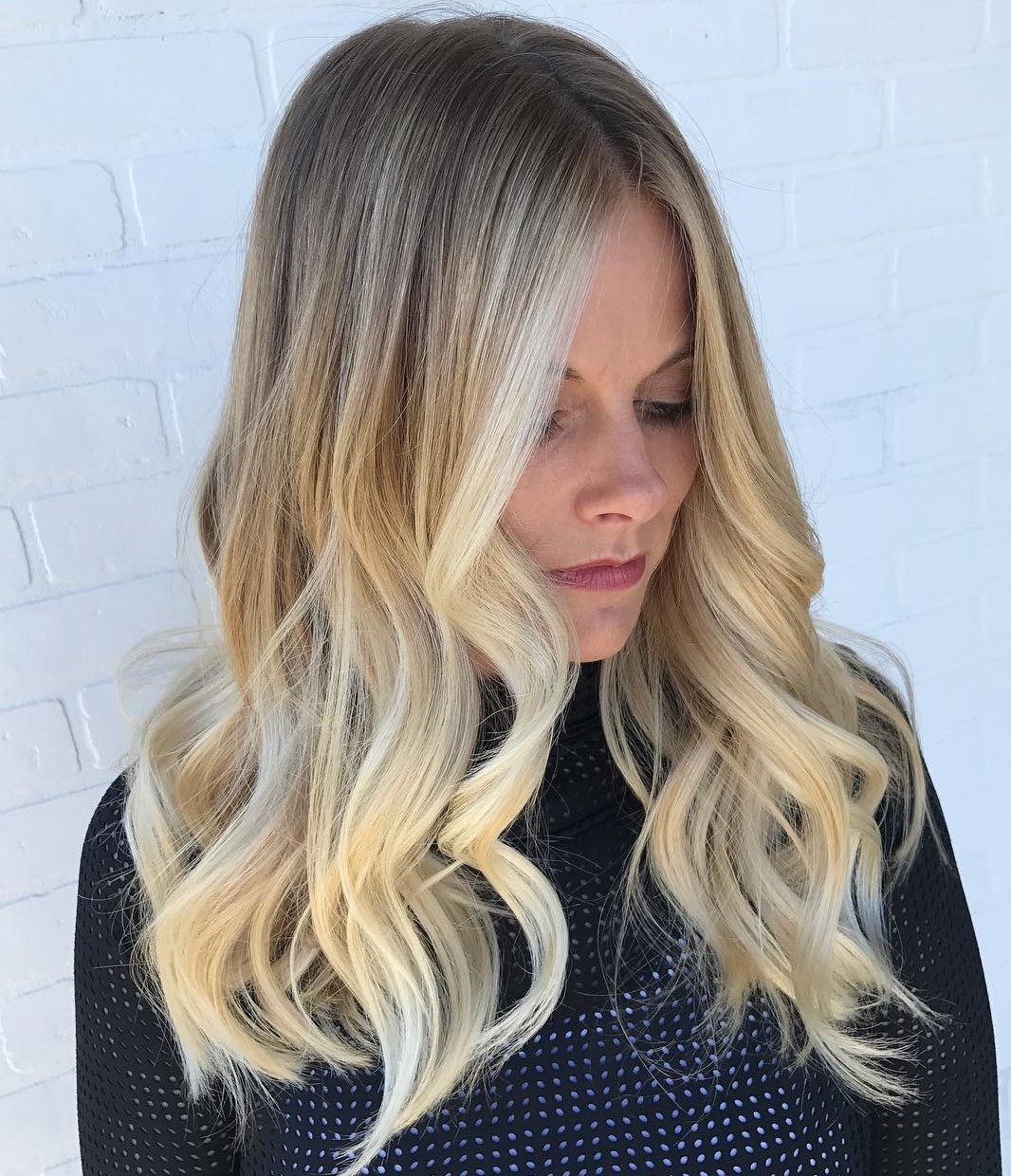 Long Blonde Hairstyle with Loose Curls
