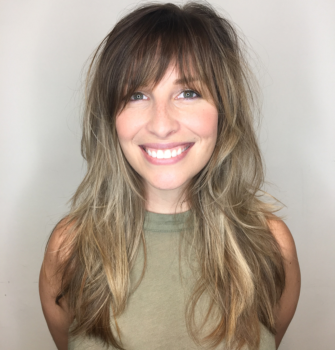 Long Haircut with Shaggy Layers and Bangs