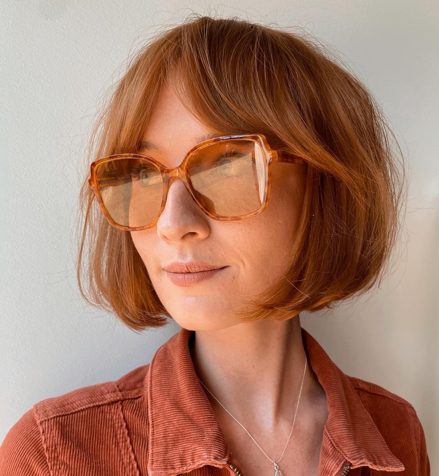 Red Bob with Curtain Bangs