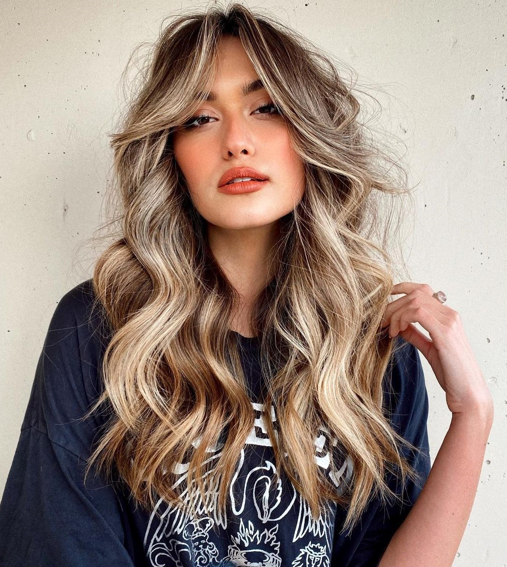 Long Hair with Waves and Curtain Bangs