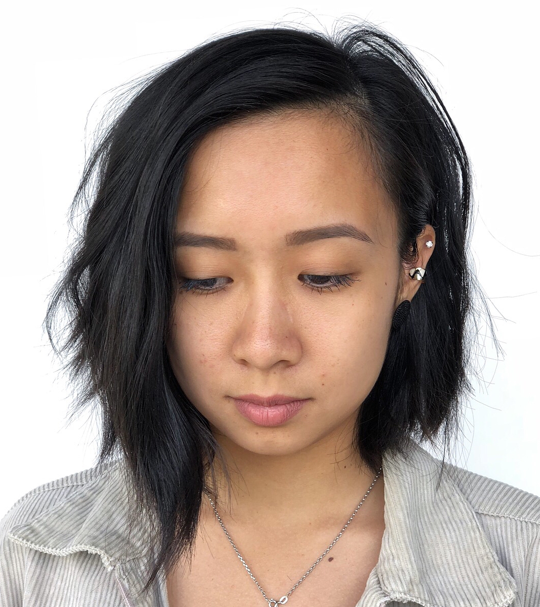 Asymmetrical Bob for a Big Forehead