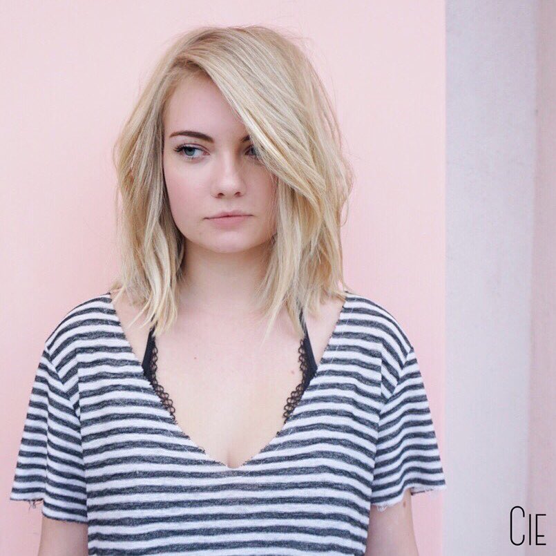 Side-Parted Lob for a Square Jawline