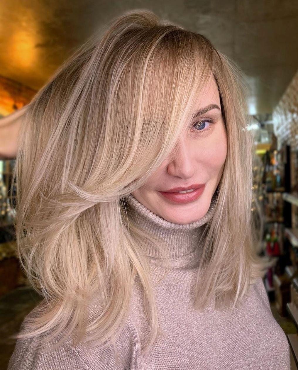 Medium Hairstyle with Swoopy Fringe