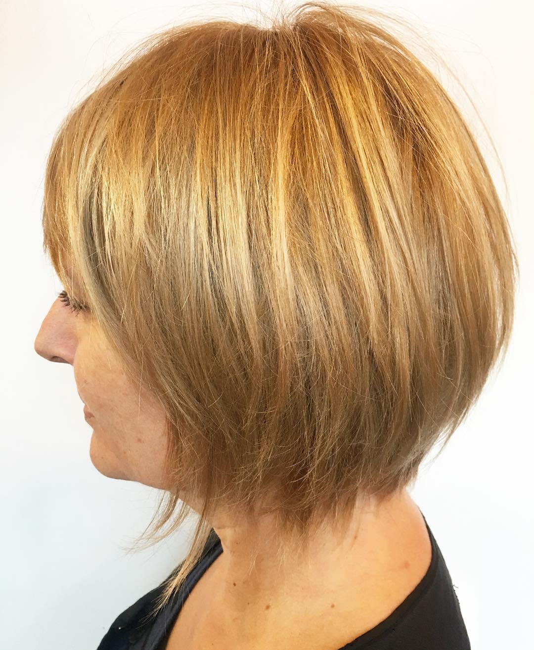 Golden Blonde Layered Bob with Bangs and Thinned Ends