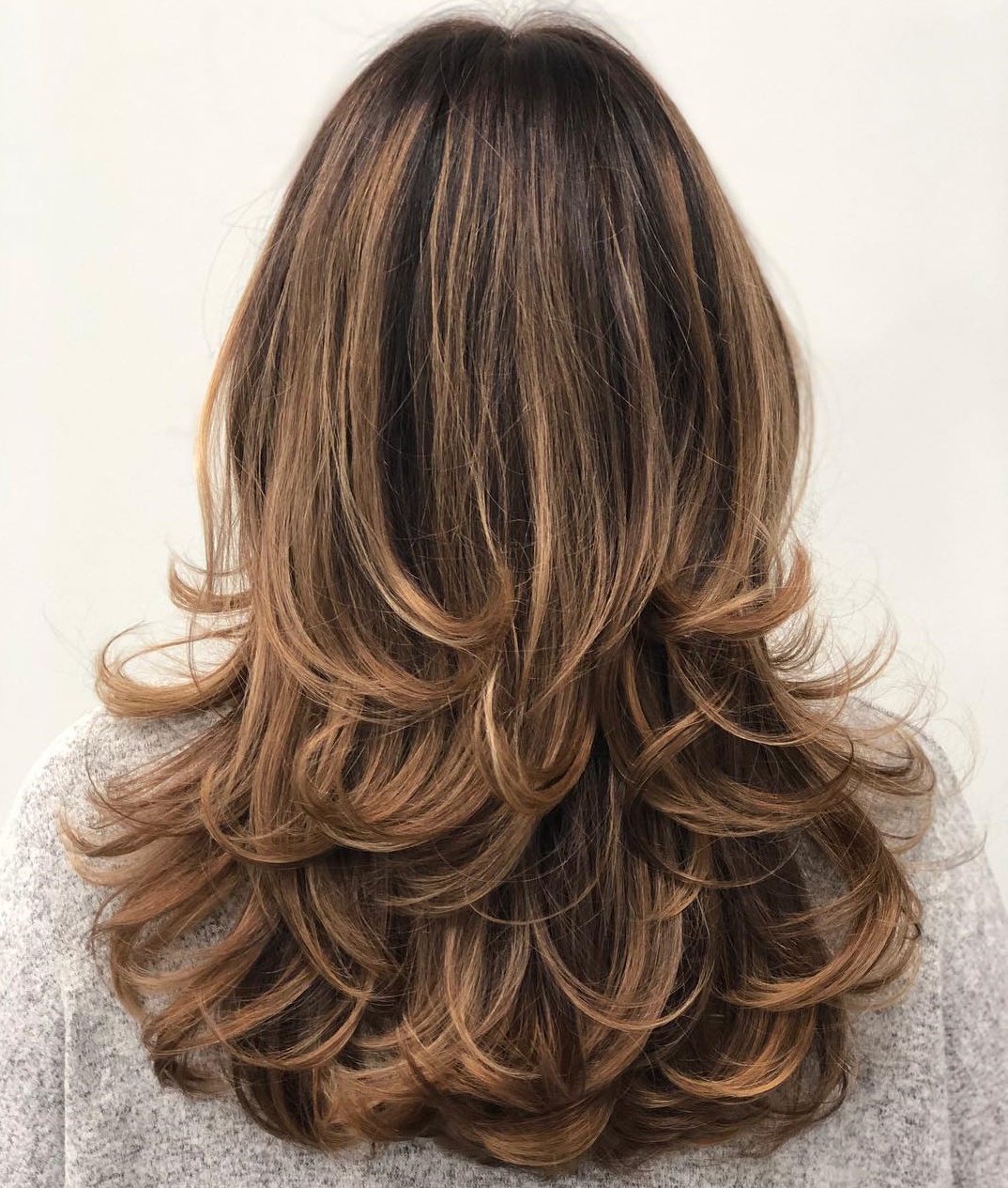 Long layered Hairstyle with Flipped Ends