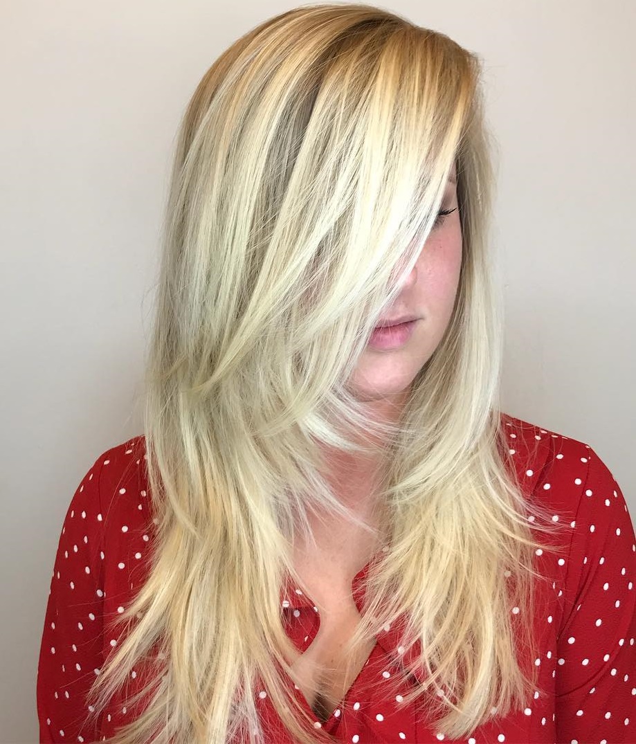 Platinum Blonde Long Feathered Haircut