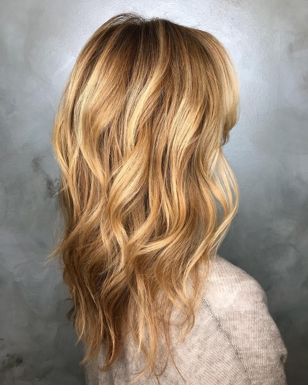 Layered Haircut with Waves and Highlights