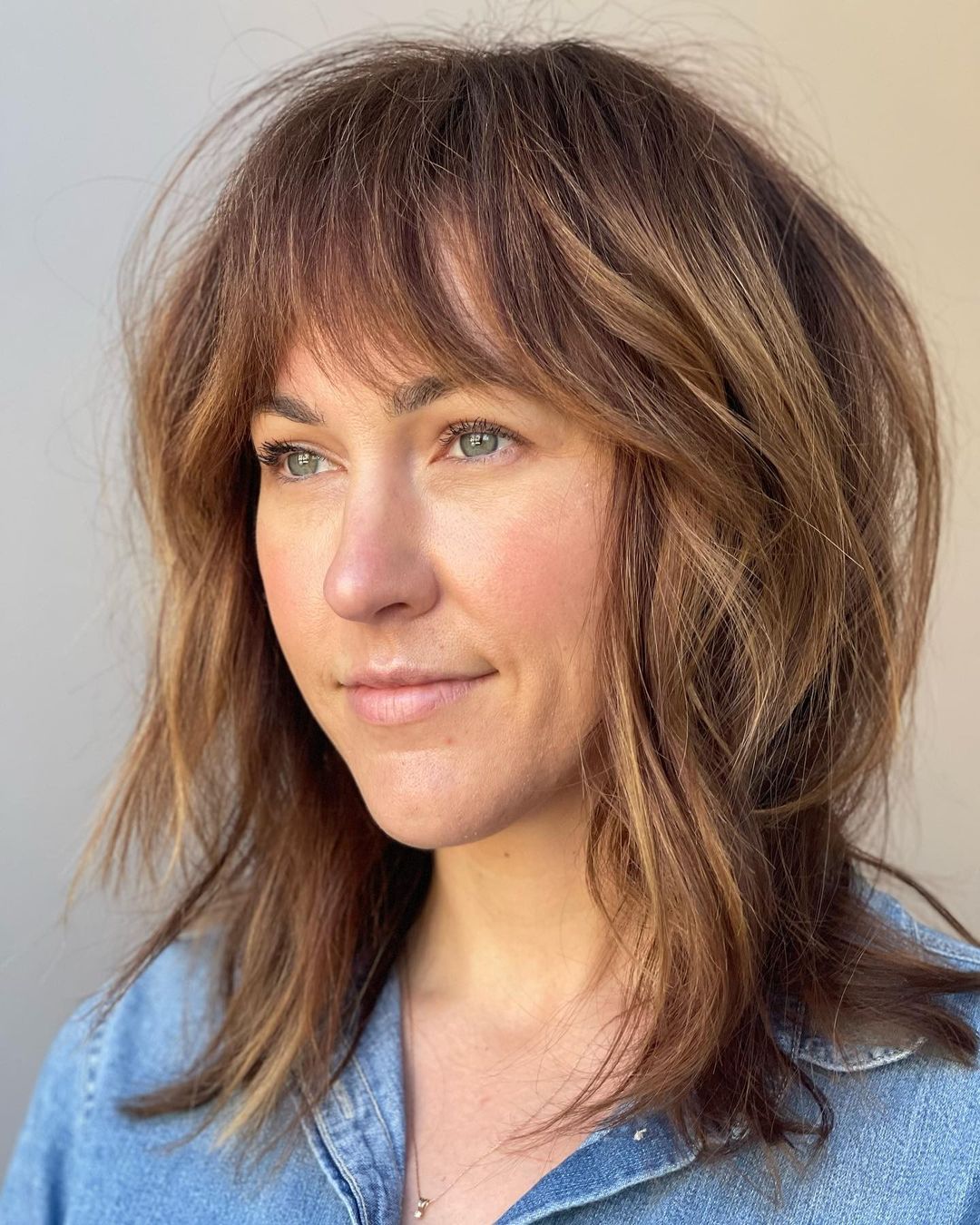 Fascinating Medium Hairstyle with Bangs
