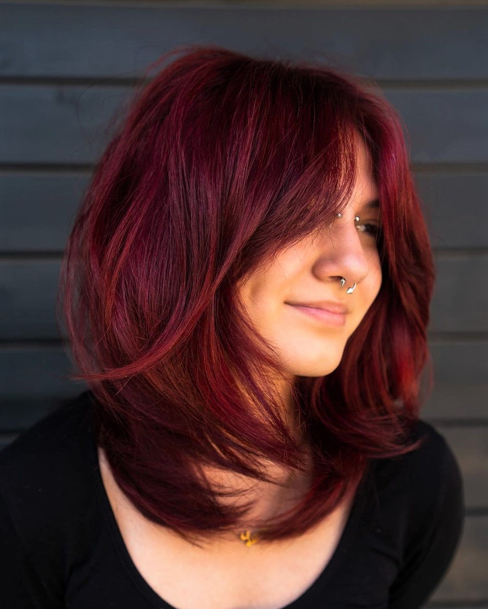 Thick Bangs and Layers for Longer Hair