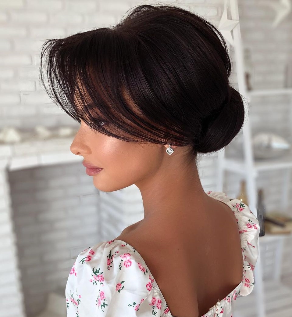 Chignon Updo with Voluminous Bangs