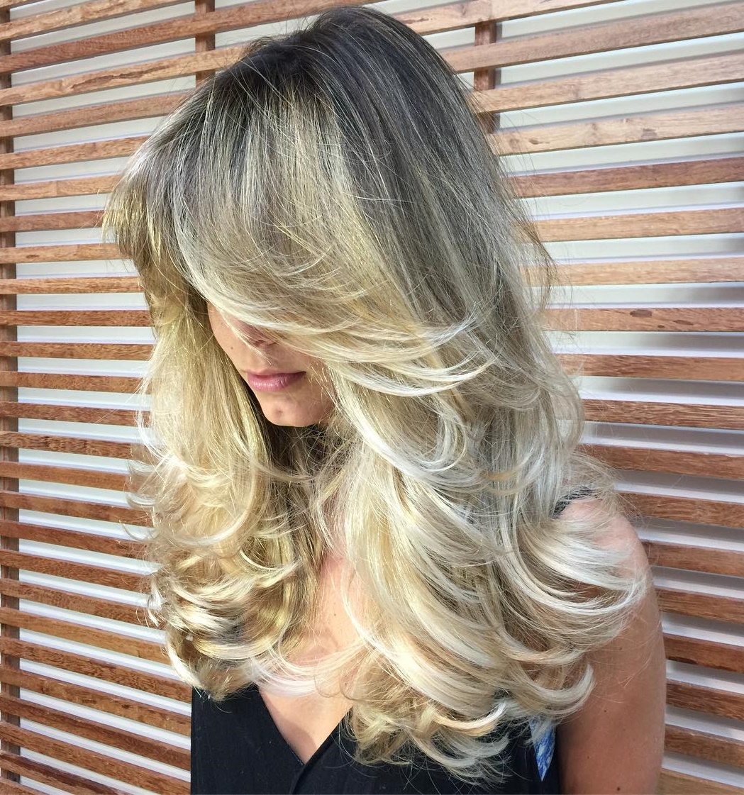 Long Gray Blonde Hairstyle with Dark Roots