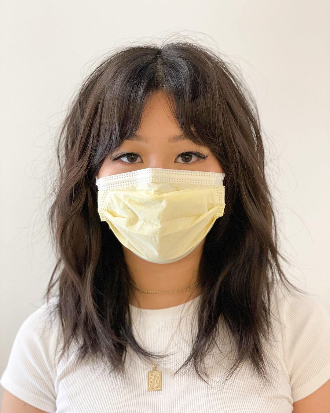 Choppy Mid-Length Haircut with Bangs