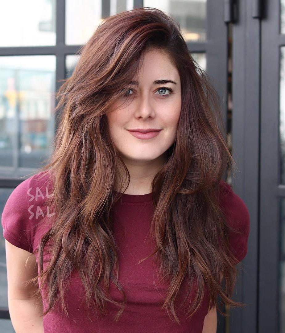 Layered Haircut with Side Swept Bangs