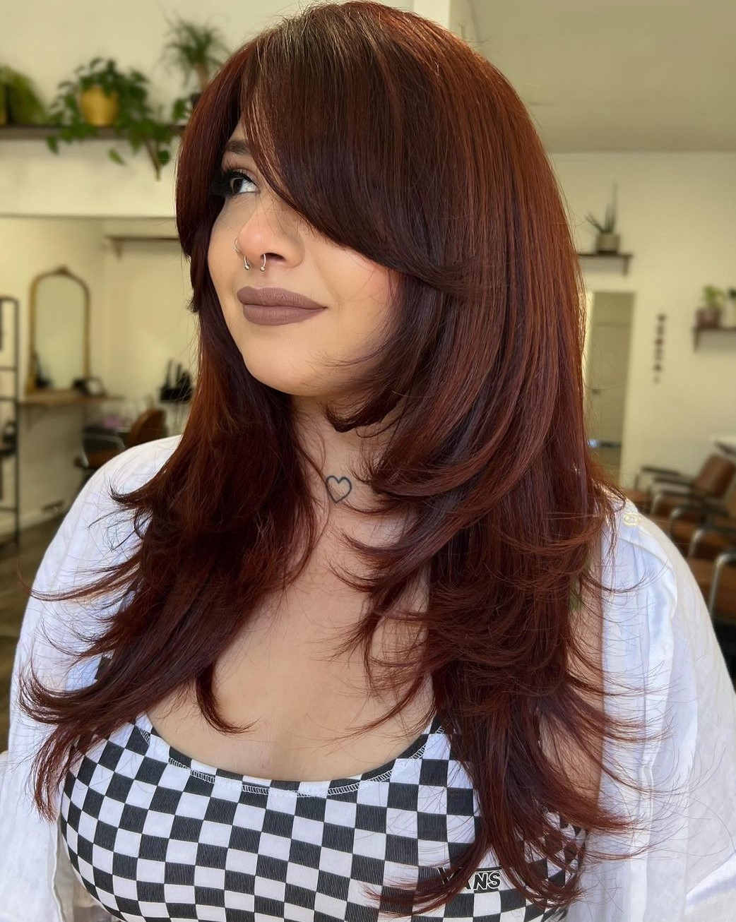 Long Hair with Curtain Bangs for a Round Face