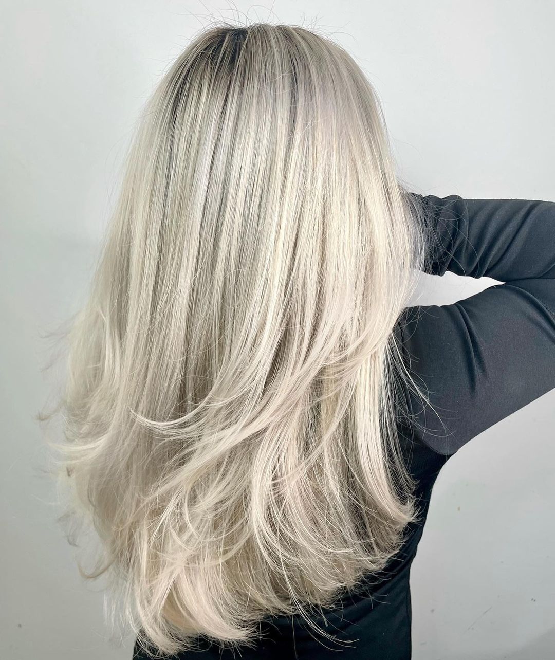 Long Feathered Platinum Hair