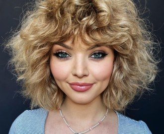 Voluminous Shaggy Bob with Curly Bangs